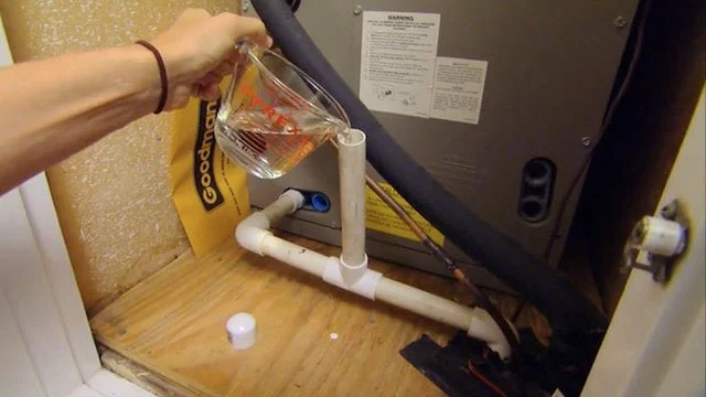 How to Fix Air Conditioner Drain Line Clogs and Prevent Water Damage